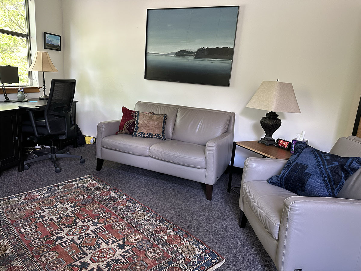 A room with couch and carpet