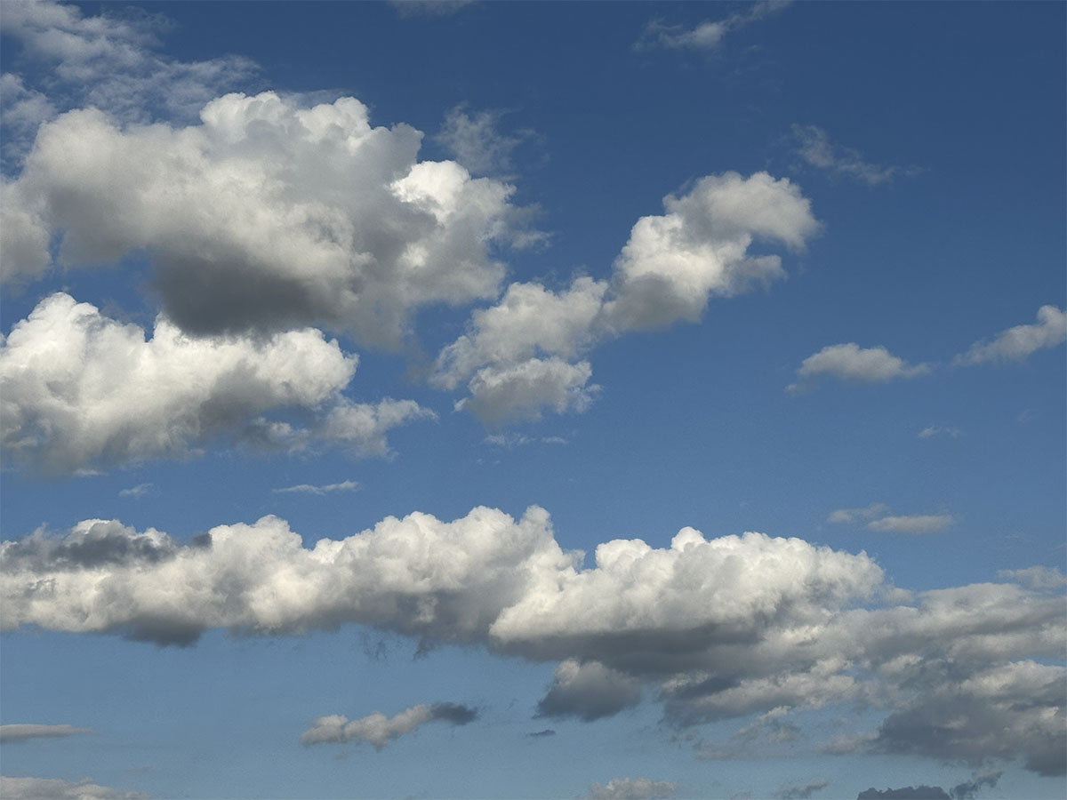 Blue sky with scattered clouds